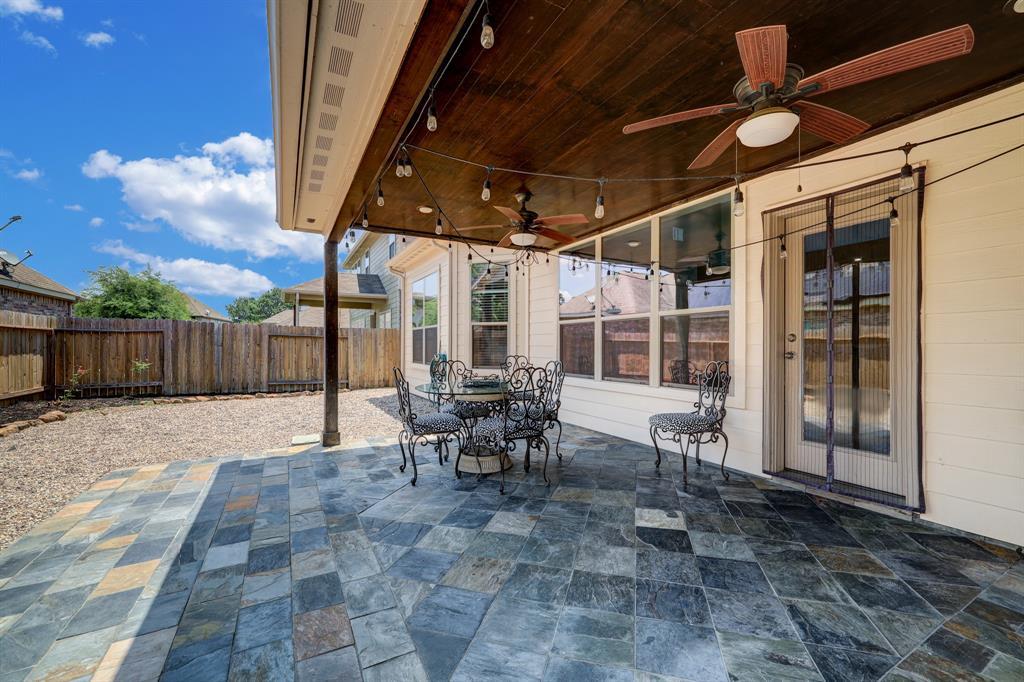 Relax after a long day under this covered patio!