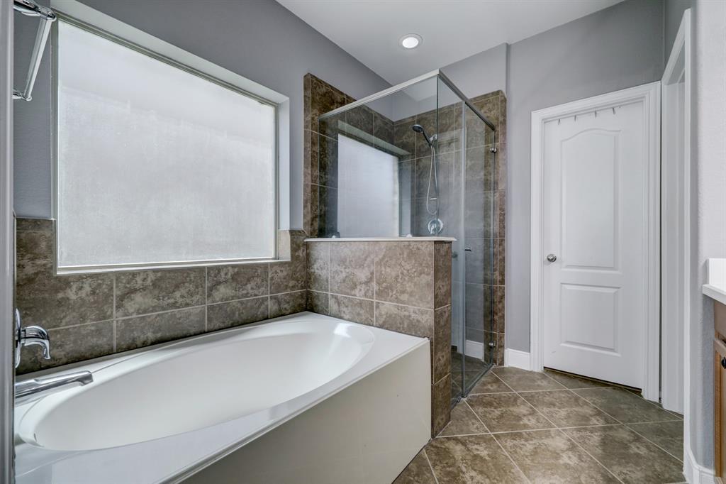 Relax in this soaking tub or shower!