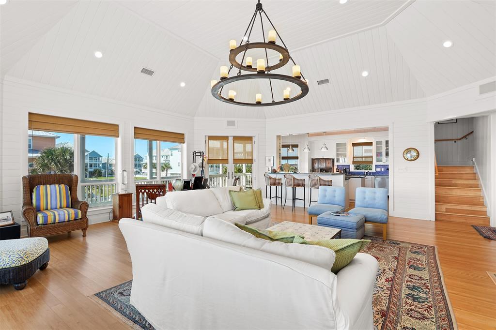 Beadboard soaring ceiling and majestic chandelier.