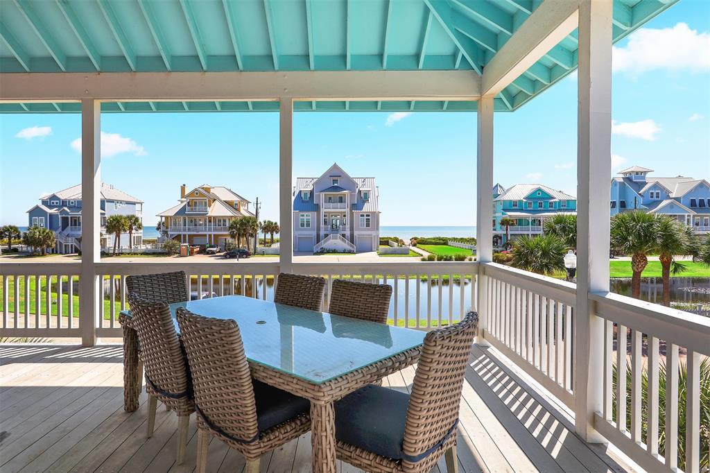 Dine outdoors, listen to music on covered porch with Gulf and Pond Views.