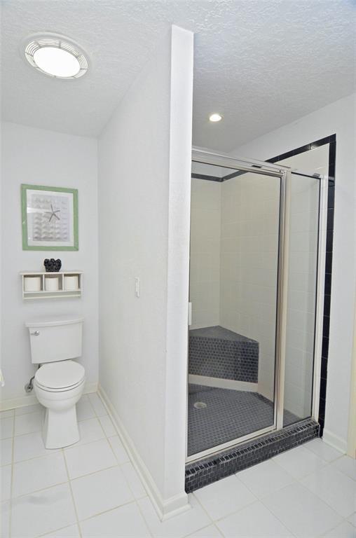 Upstairs bathroom with a large walk-in shower.