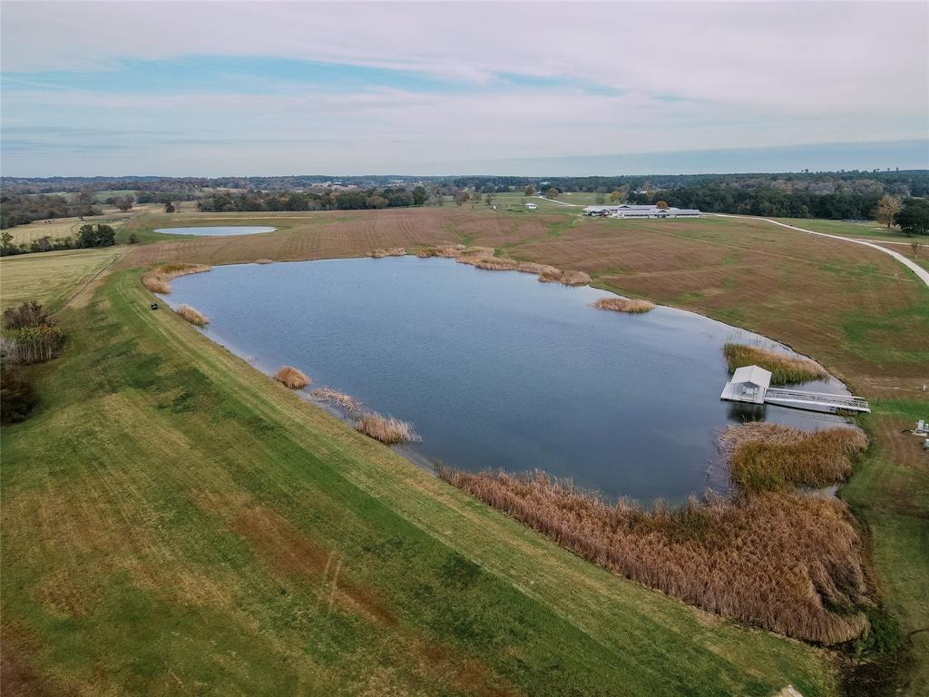 8 Acre stocked lake surrounded by picturesque landscape