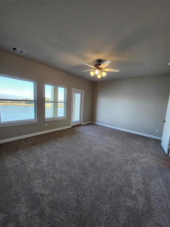 Main bedroom is spacious & has great views all around - door out to private balcony