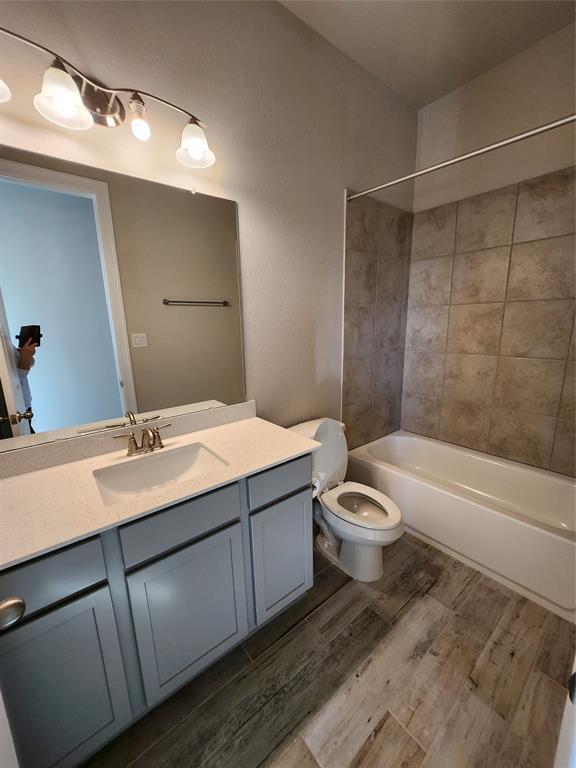1st floor bath has large vanity, tile flooring