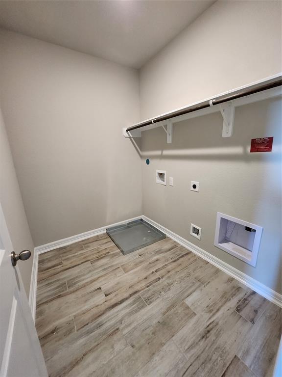 Utility room on top floor has extra room for fridge or pet area