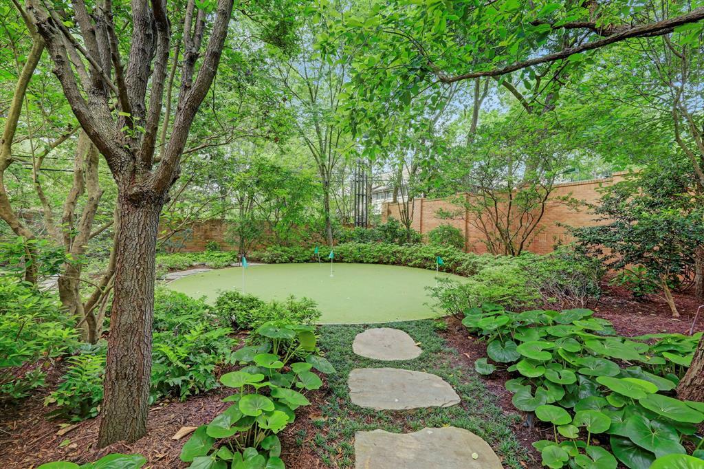 The Putting Green and secret garden is accessed from backyard.