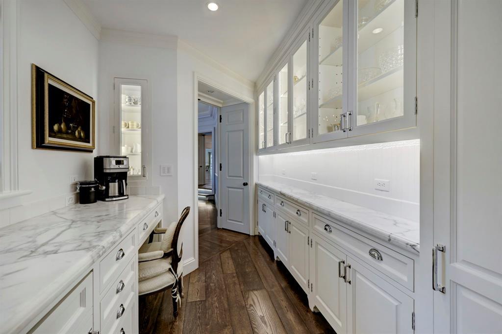 The Butler's Pantry. Marble counters, glass front cabinets and ample drawer and cabinet storage.
