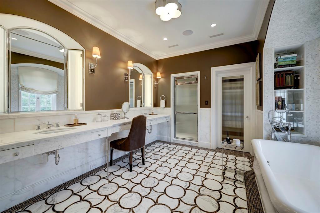 The Guest Suite Bath with double sinks, soaking tub, separate shower and private water closet.