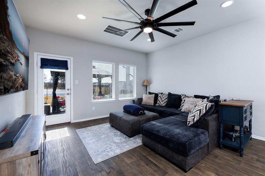 Big updated fan for large space and recessed lighting in kitchen and living room.