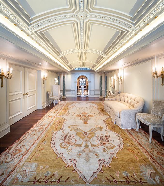 Ornamental barrel-vaulted ceilings decorated with rosettes and leaf motifs escort you through the second floor.