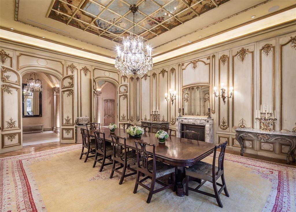 Salon wall panels and doors were imported from Europe, meticulously restored and installed in this majestic dining room.