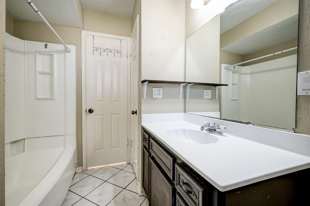 Guest bathroom on the first floor.  Access through the downstairs bedroom and through the hallway!