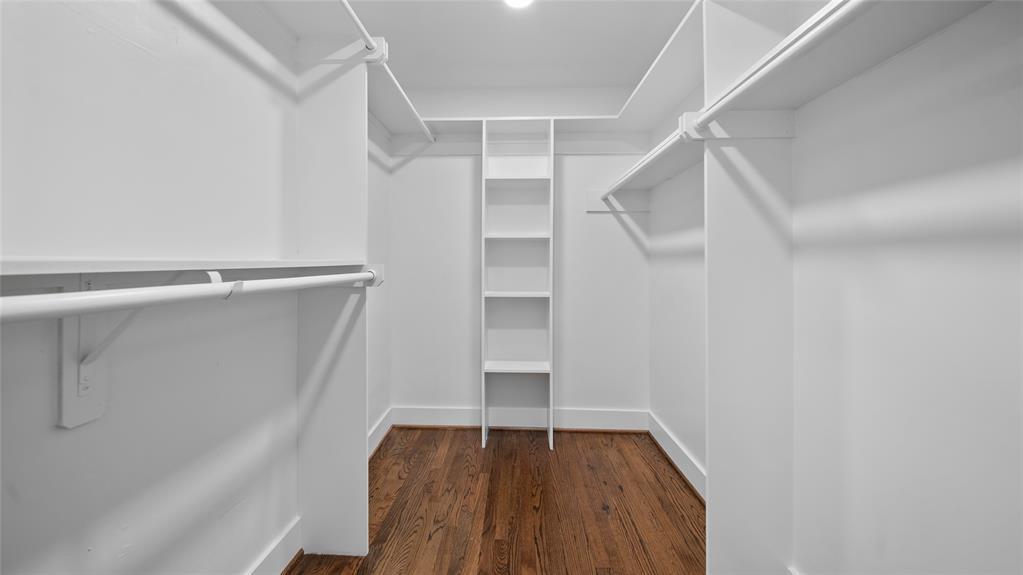 The generous walk-in closet provides ample storage for your wardrobe and treasures, ensuring that your personal space remains uncluttered and organized.