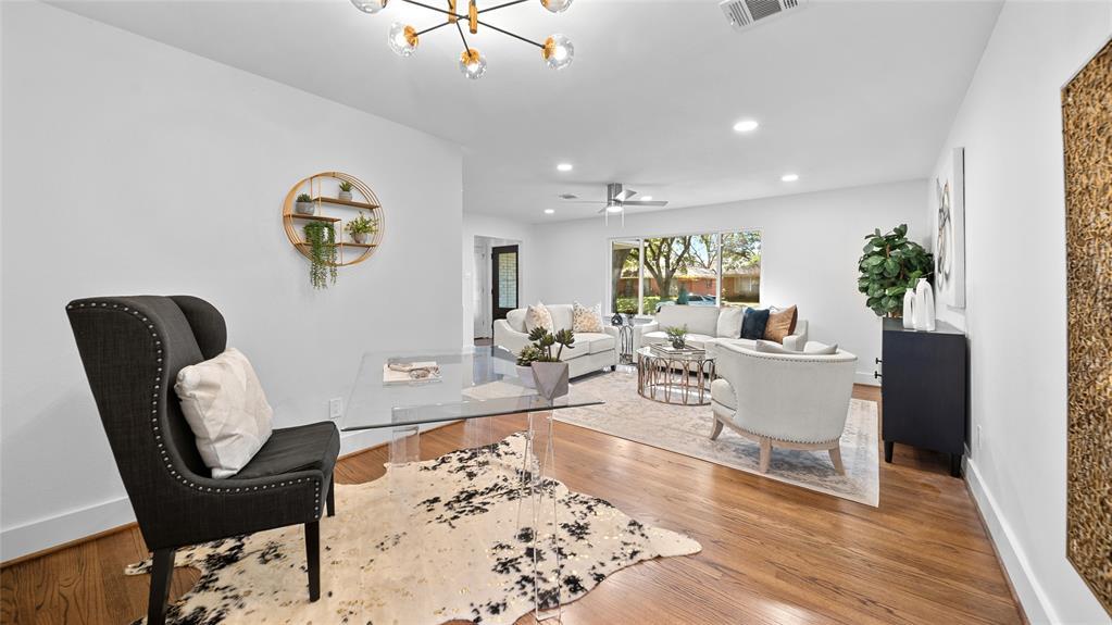 The open layout effortlessly connects this family room to the adjoining areas, creating a seamless flow that's perfect for both family gatherings and entertaining friends.