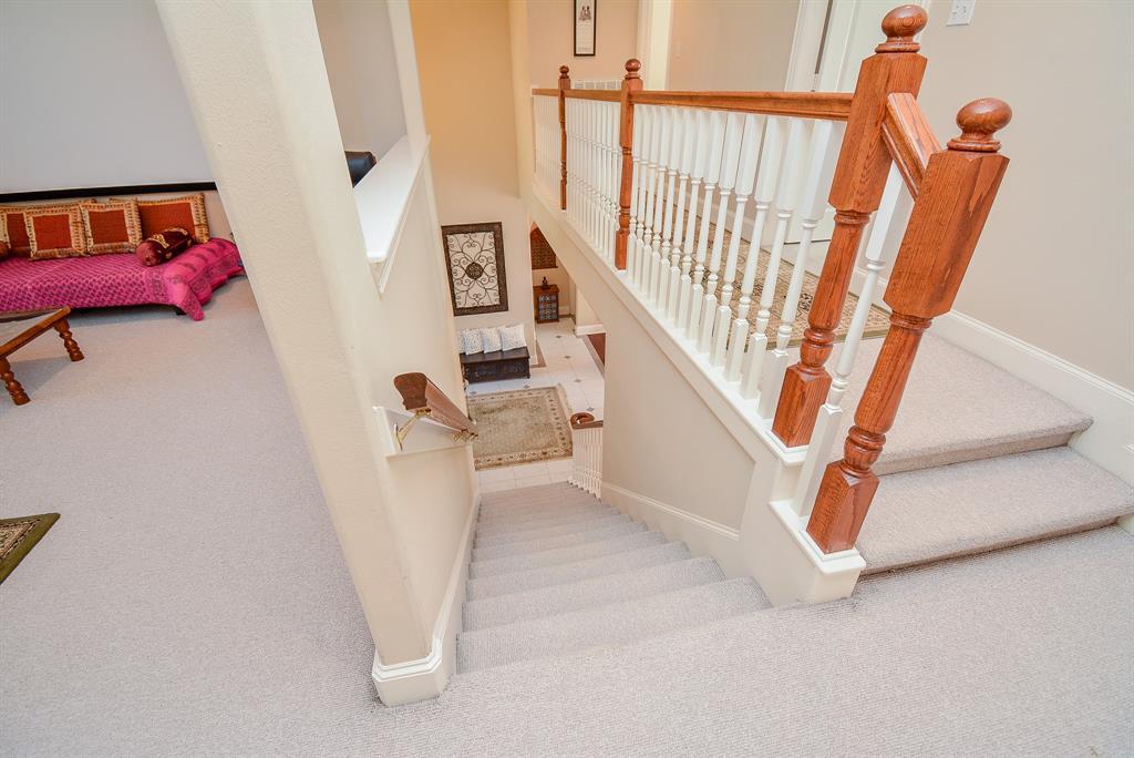 Stairs lead to upstairs 3 bedrooms and a large game room!
