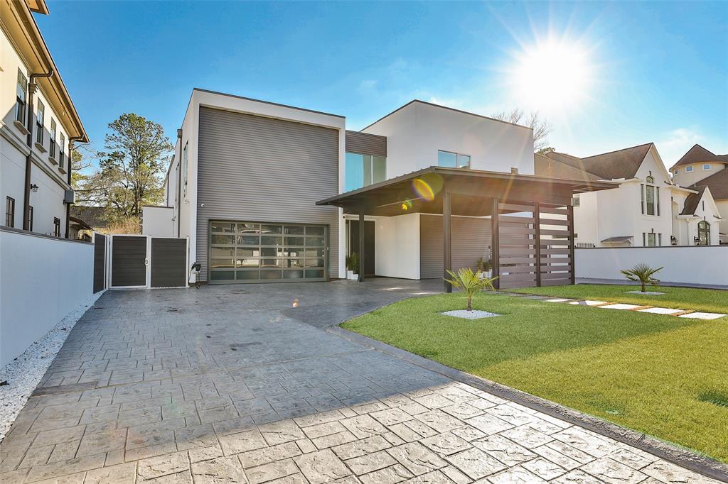 Whole home Savant automation, dual electric gates, TRIPLE pane windows, palatial pavers and sleek lines make this Riedel Estates, City Center home stand out amongst the crowd.