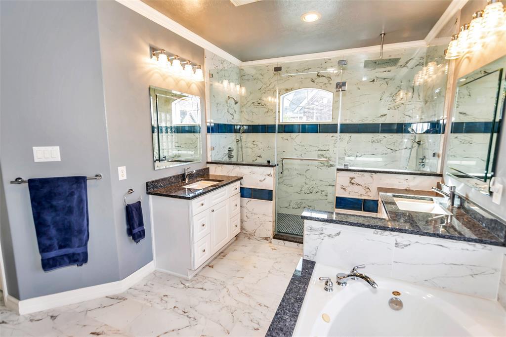 WOW! Look at this amazing, Spa-like remodeled, bath with oversized walk-in shower.