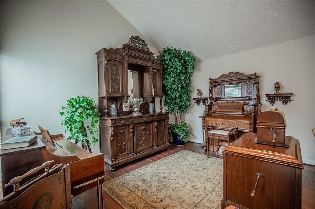 The other portion of the large family room, currently styled as a music room.