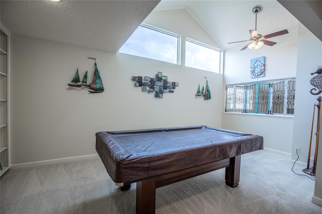 Upstairs game room.  The new owners are welcome to keep the pool table.