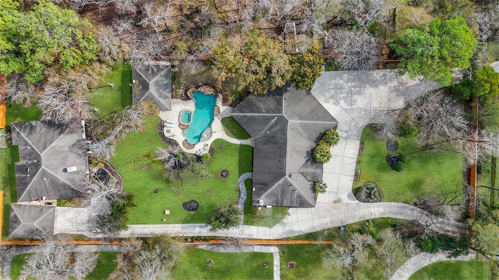 Welcome to a true oasis of peace within the big city!  It's legal subdivision name is even "Villa de la Paz."  This fabulous retreat consists of two 2000's era one level homes with currently a shared pool and pool house set on a fenced and gated 1.29 acres of land.