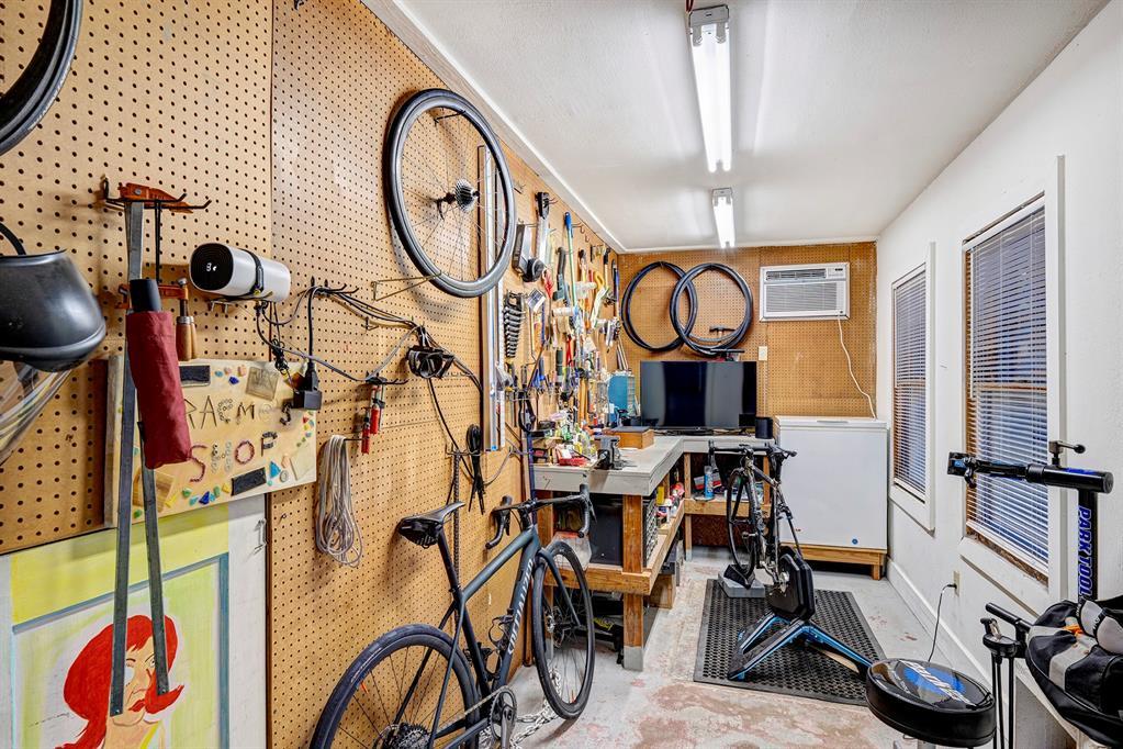 Workshop attached to the side of the garage is ideal for those who like to tinker.