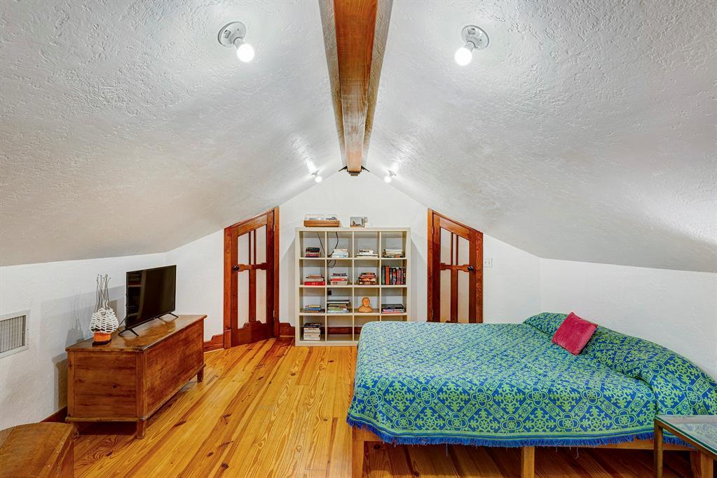 Upstairs bedroom is ideal for a guest with wraparound closet.