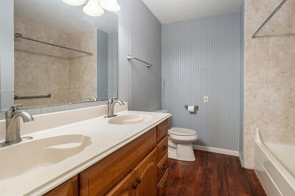 Full size bathroom with a double vanity.