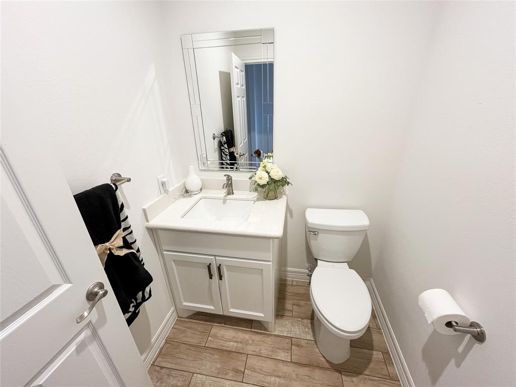 Half bath in the front of the house perfect for guests