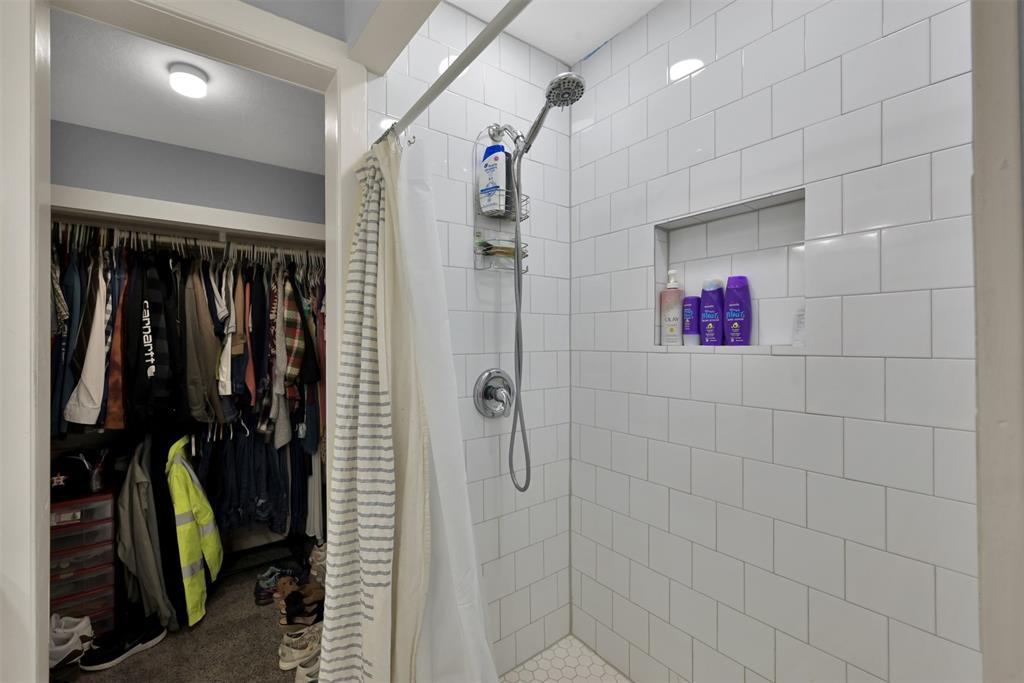 (Unit A) Another view of the primary shower as well as the spacious primary closet.