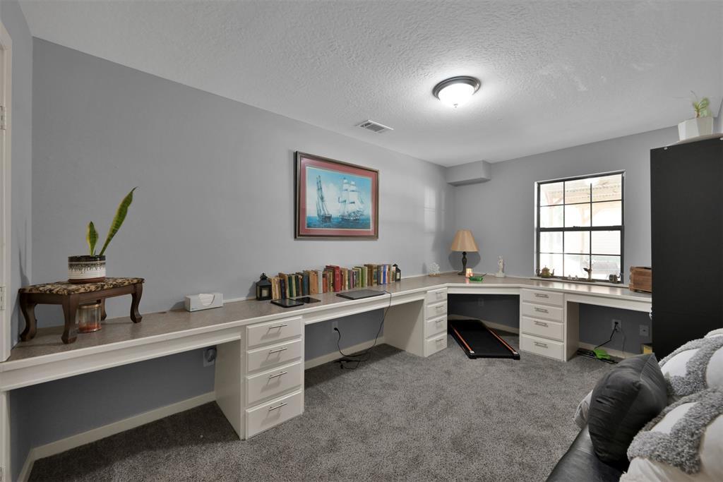 (Unit A) This area is perfect for an office or study! The built in offers endless desk space. This room could also fit a smaller bed to serve as a bedroom.