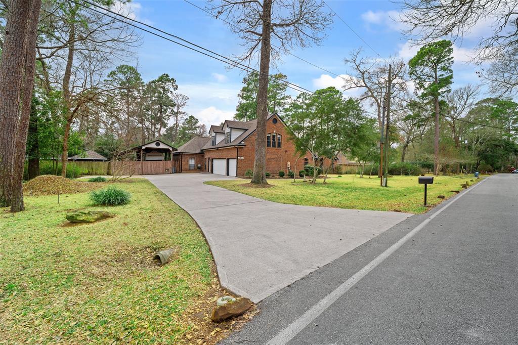 The driveway leading to the home is breathtaking. The RV/boat storage is conveniently located, and the beautiful grounds are well-maintained. Don't miss out on seeing this property, schedule your appointment today.