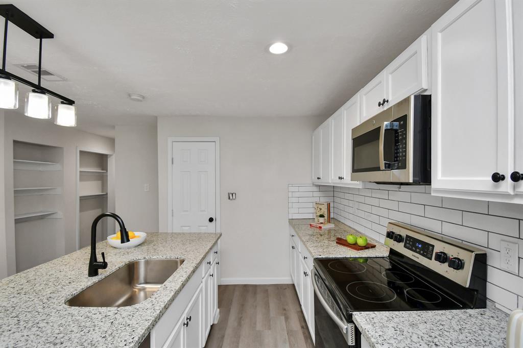Dedicated laundry room with ample storage