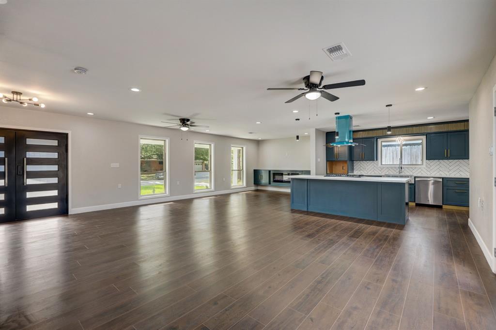 The kitchen is open to the living and dining areas allowing conversation to flow throughout. Perfect space for entertaining.