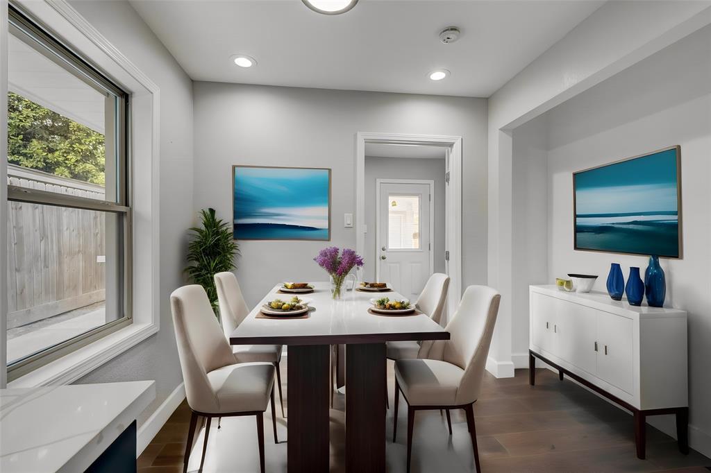 The breakfast area off the kitchen offers more dining space as well as a flex space for a decorative cabinet/hutch or extra pantry space with the addition of shelving. *Photo virtually staged to show potential*