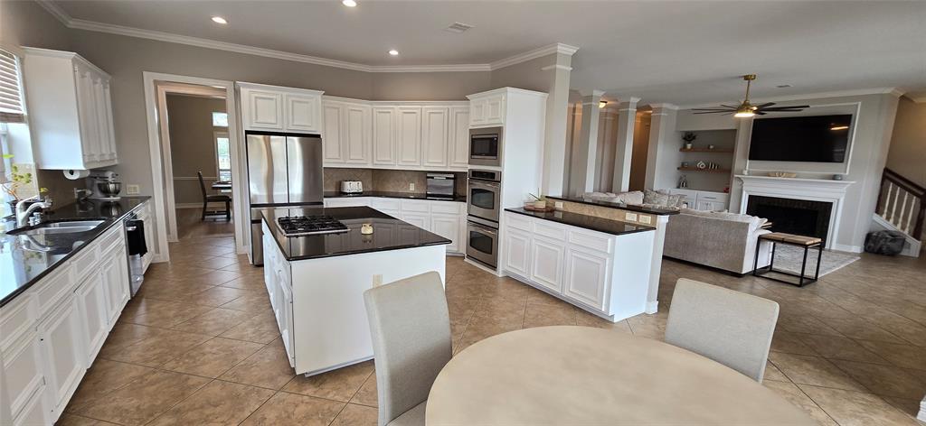 Spacious kitchen with ample room for storage and counter space. Butlers pantry between kitchen and dining