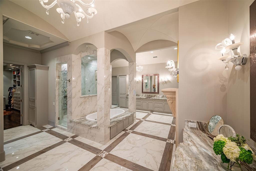 Following from the primary suite is the gorgeous bath suite that not only architecturally stunning but functional and provides the upmost luxury and comfort.