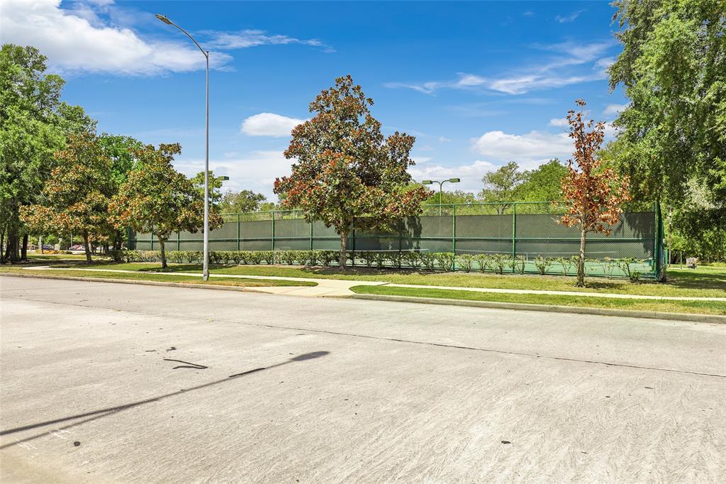 Catch a game of Tennis or Pickle Ball on this court. Only a short walking distance or drive from the home.