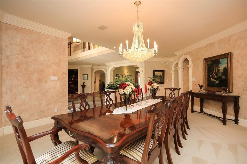 The formal dining room could seat a banquet!  This view shows a table for 10, but there is plenty of room for more.