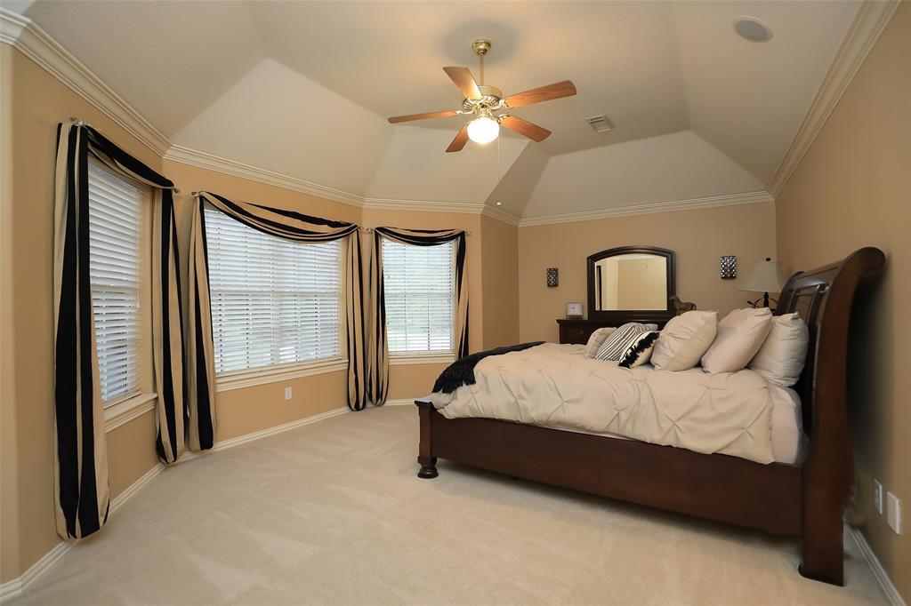Secondary bedroom # 2.  Also very generous in size and features a beautiful bay style window.