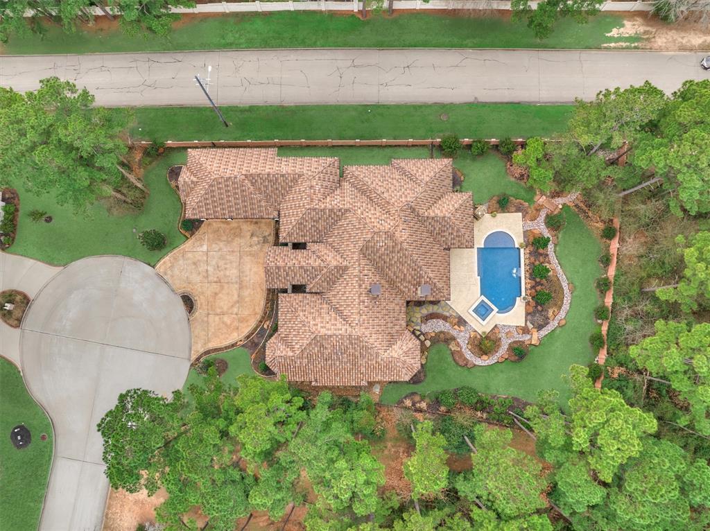 This magnificent 3 bedroom, 3 full bath, 2 half bath home is in the gated section of Bentwater Bay and is perfectly situated in a cul-de-sac on almost half an acre.