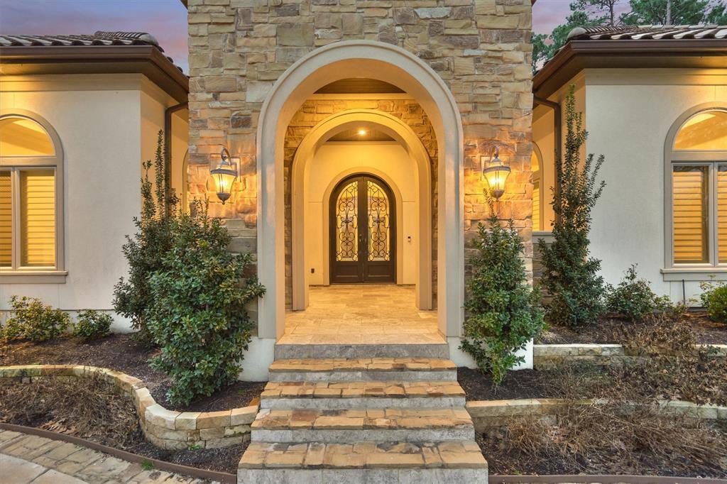 The beautiful European-styled entrance is sure to impress and sets the tone for this exquisite home!