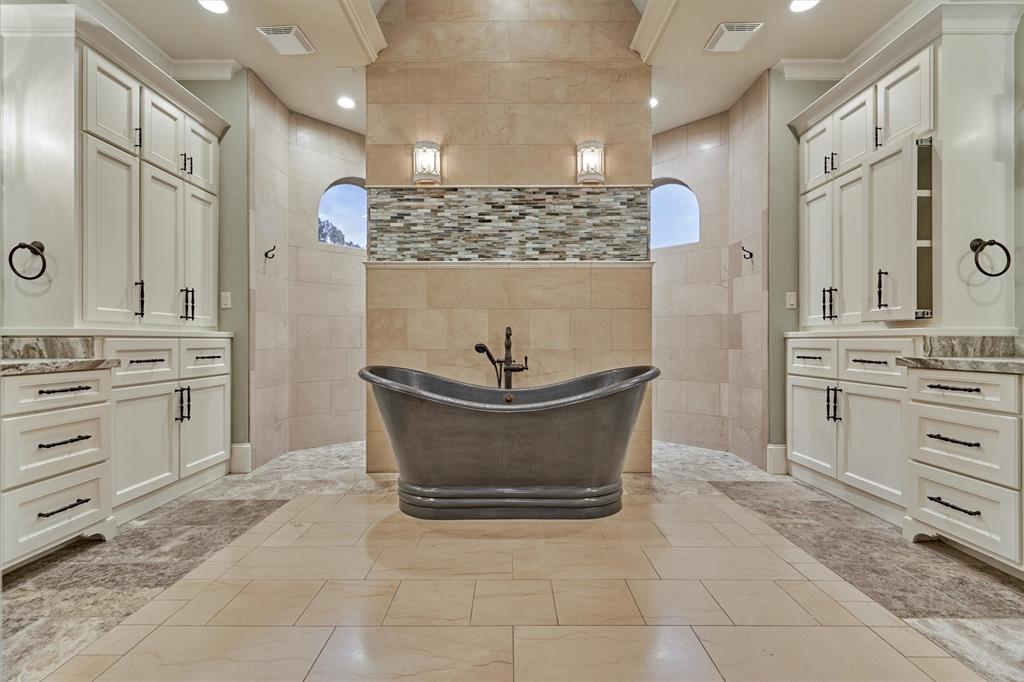 The primary ensuite has a spa-like ambiance that exudes luxury and relaxation.