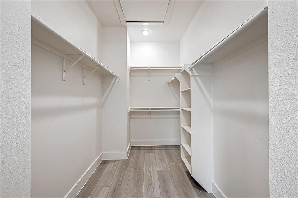One of the two huge walk-in closets. Interior photos are from another community by the same builder; finishes and selection may vary.
