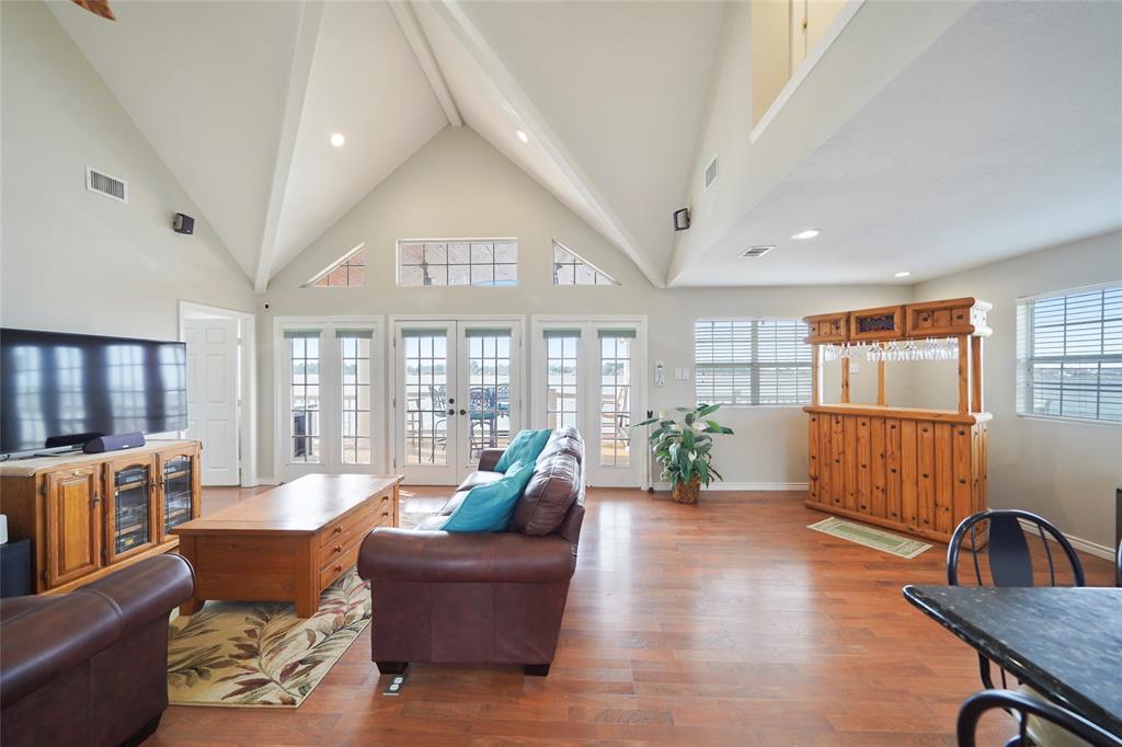 Soaring ceilings and natural light greet you upon entry.