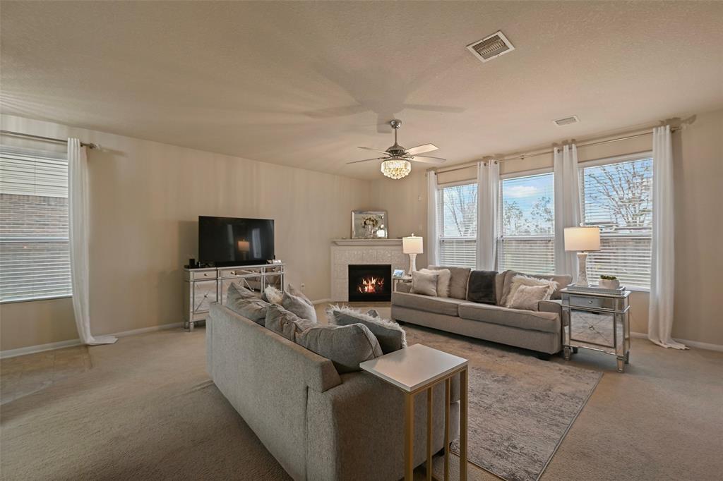 Big Family room with gas log fireplace.