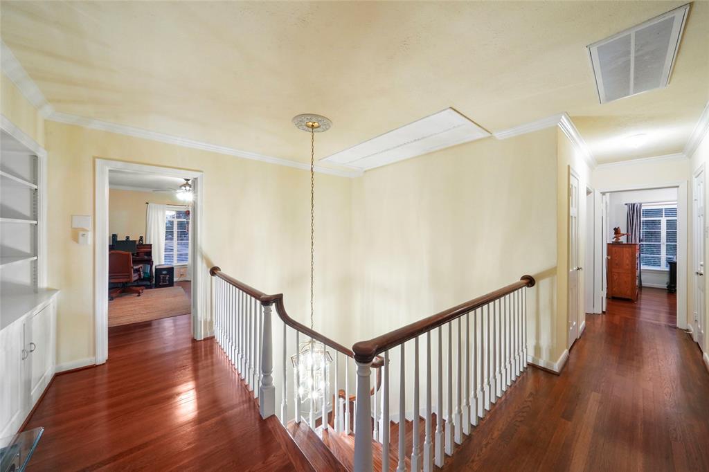 2nd Floor Landing - this large landing features original built-in bookshelves and cabinetry, landing provides direct access to each of the 4 bedrooms as well as access to two additional storage closets including a large walk-in hall closet