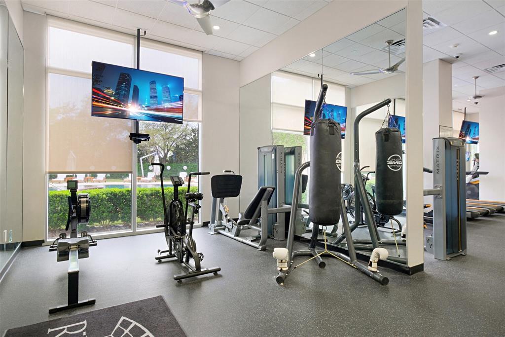 The recently updated exercise room overlooks the pool area.