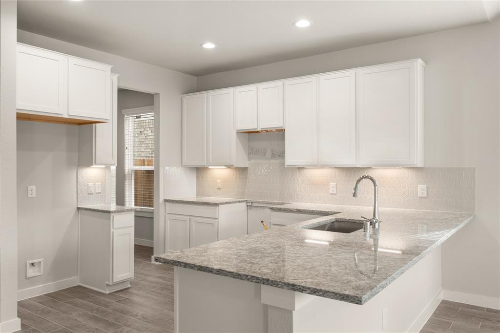 Plan 265 features 4 bedrooms, 3 full baths, 1 half bath, and over 2,600 square feet of living space.