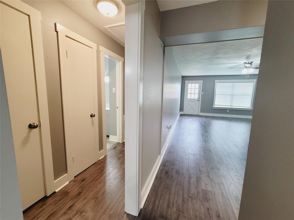 hallway leading to secondary bedrooms