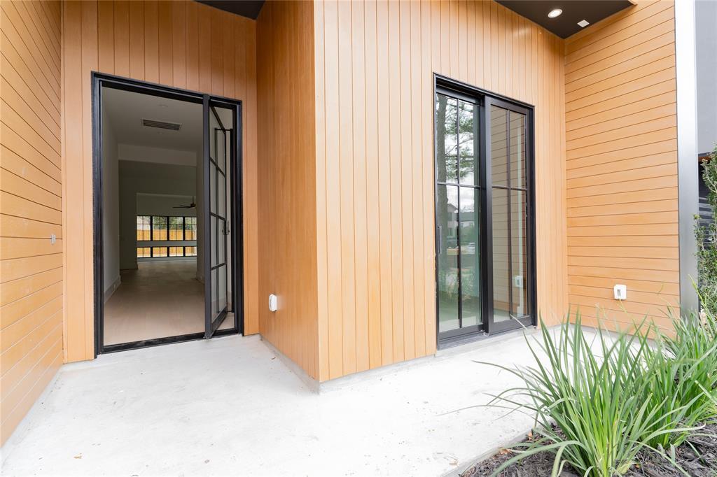 This steel pivot door is an amazing touch.
